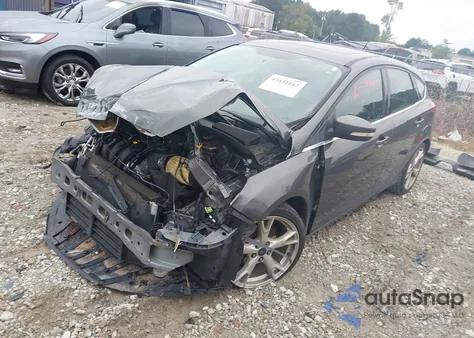 2016 Ford Focus Titanium z USA, uszkodzony, nr VIN 1FADP3N20GL300628